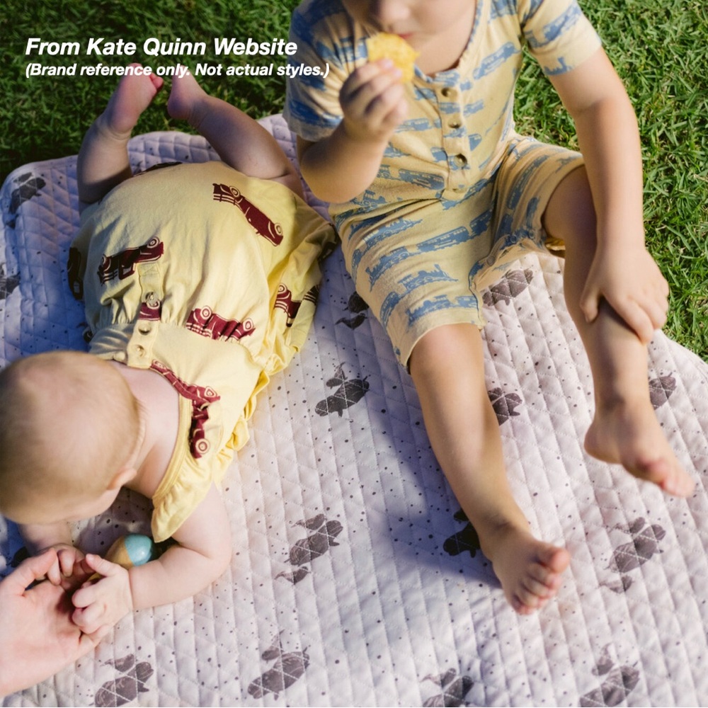 NWT: KATE QUINN RIBBED SLEEVELESS ROMPER IN PURPLE FLORAL (3-6M)